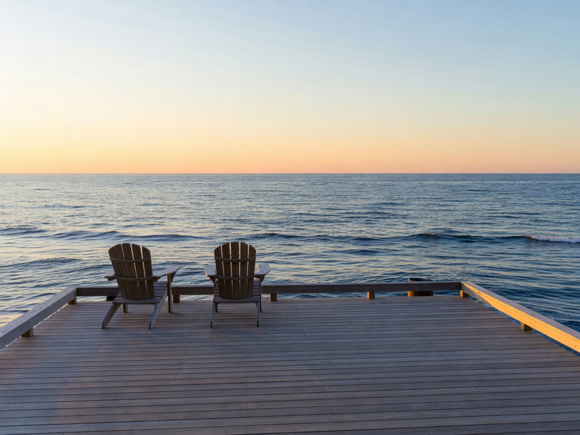 Serene waterfront escape with wooden deck overlooking the ocean